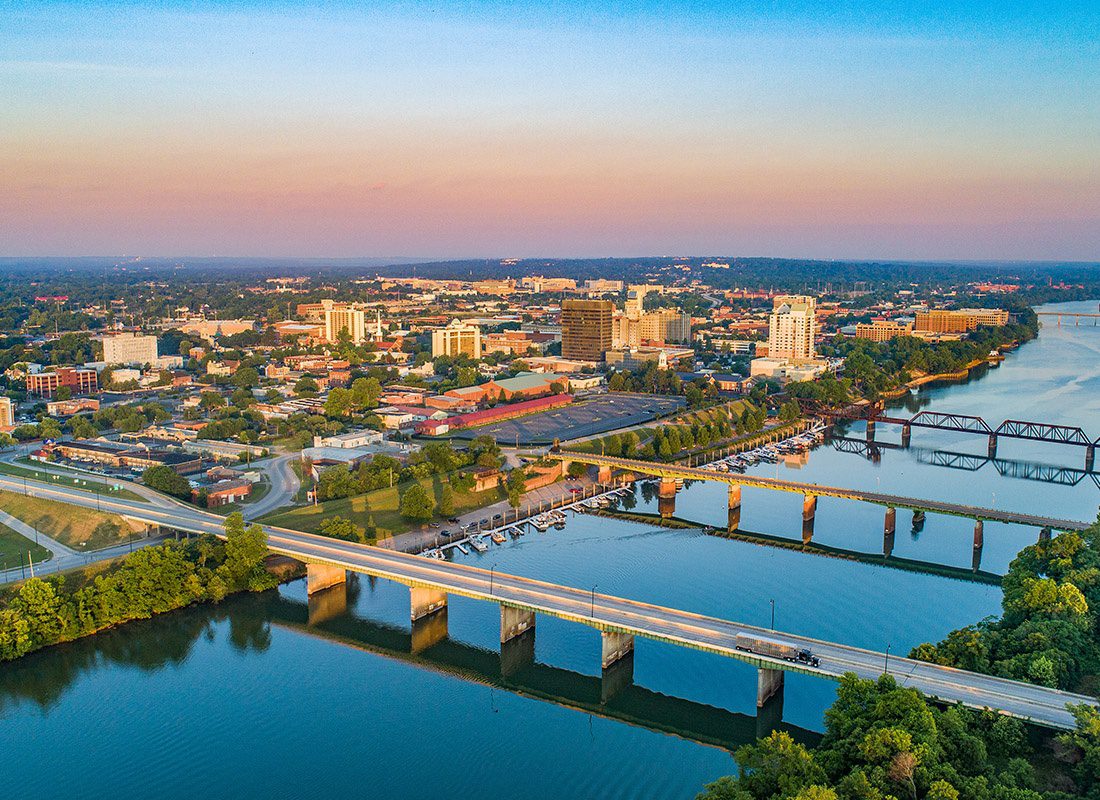 About Our Agency - Aerial View of Augusta, Georgia With Three Bridges Crossing a River