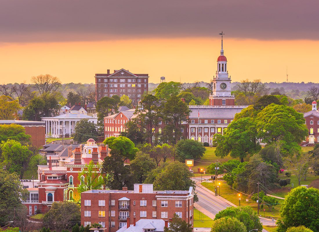 Contact - Aerial View of Macon, Georgia With Brick Buildings During Sunset